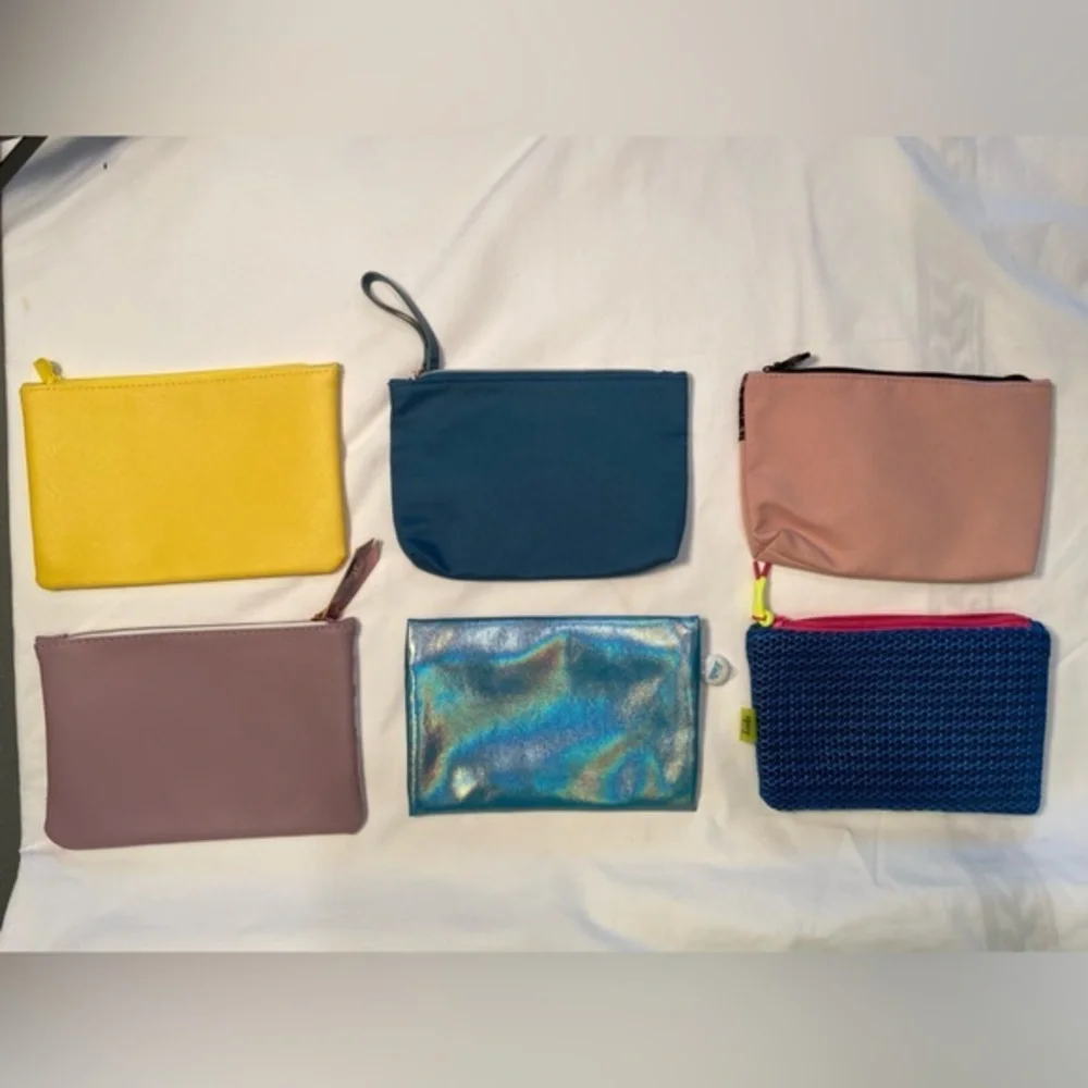 Ipsy, pouches with zipper, like new, price is for all 6 items‎